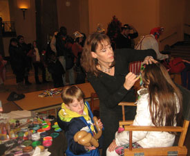 Barb face painting at First Night Alexandria